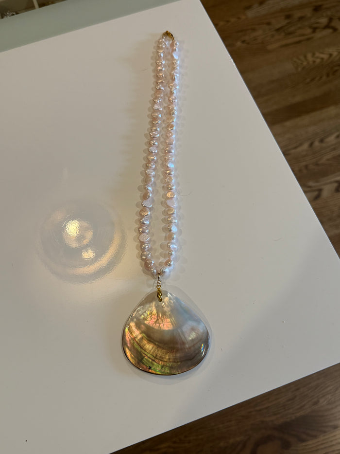 Pearl necklace with shell by Kimberly Aman