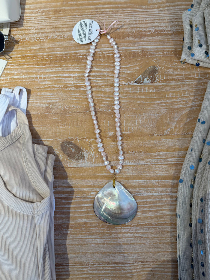 Pearl necklace with shell by Kimberly Aman