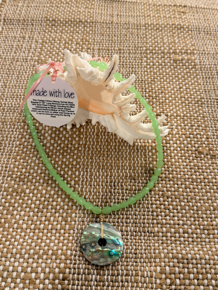 Twirled Glass Necklace with a Mother of Pearl Pendant by Kimberly Aman