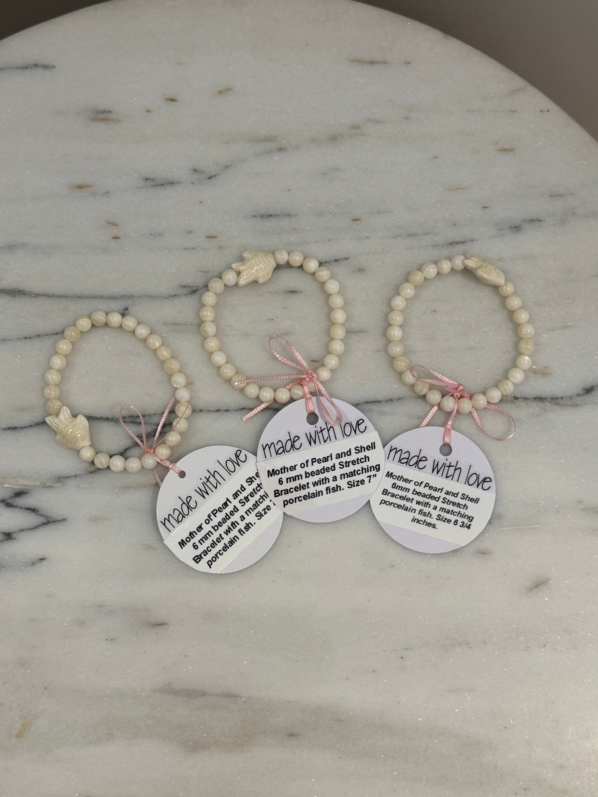 Mother of Pearl Fish Bracelets by Kimberly Aman